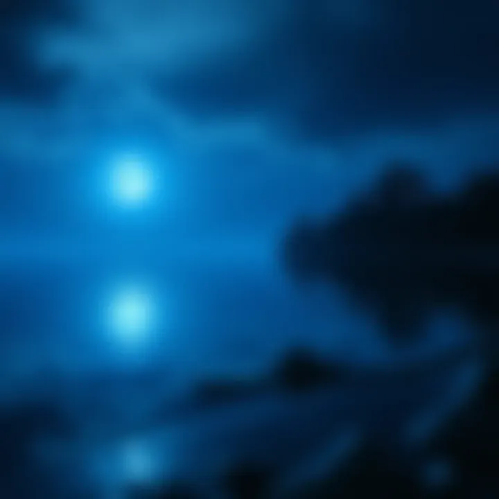 A bright blue moon shines over a calm lake, reflecting its light on the water's surface at night.