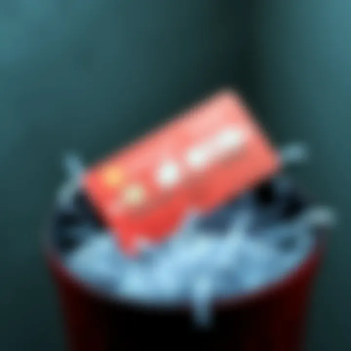 A bricked credit card is placed in a trash can along with shredded paper for secure disposal