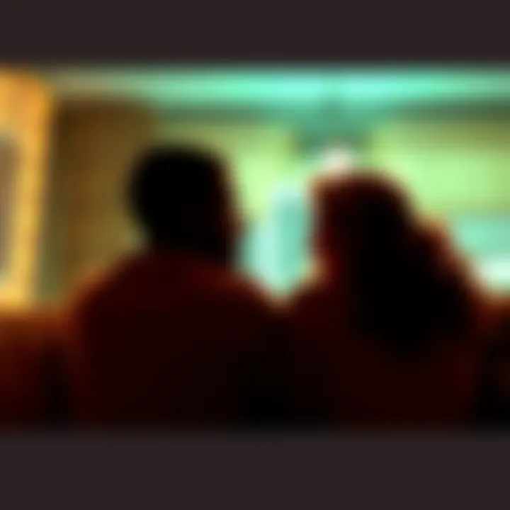 A couple sitting close together, sharing a warm moment, discussing intimacy and connection in their relationship.