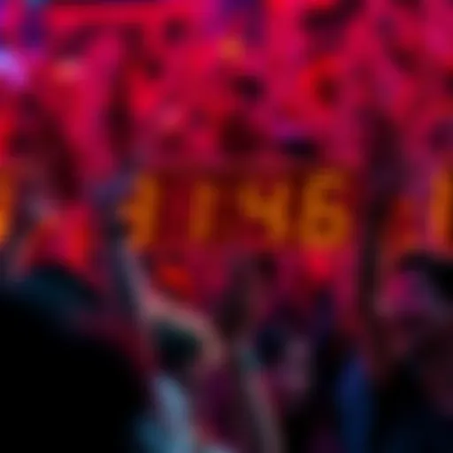 A crowd of people eagerly watching a countdown timer with a mix of anticipation and excitement on their faces.