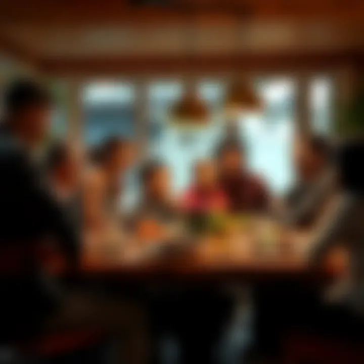 A family gathered around a dinner table, sharing laughs and enjoying each other's company.