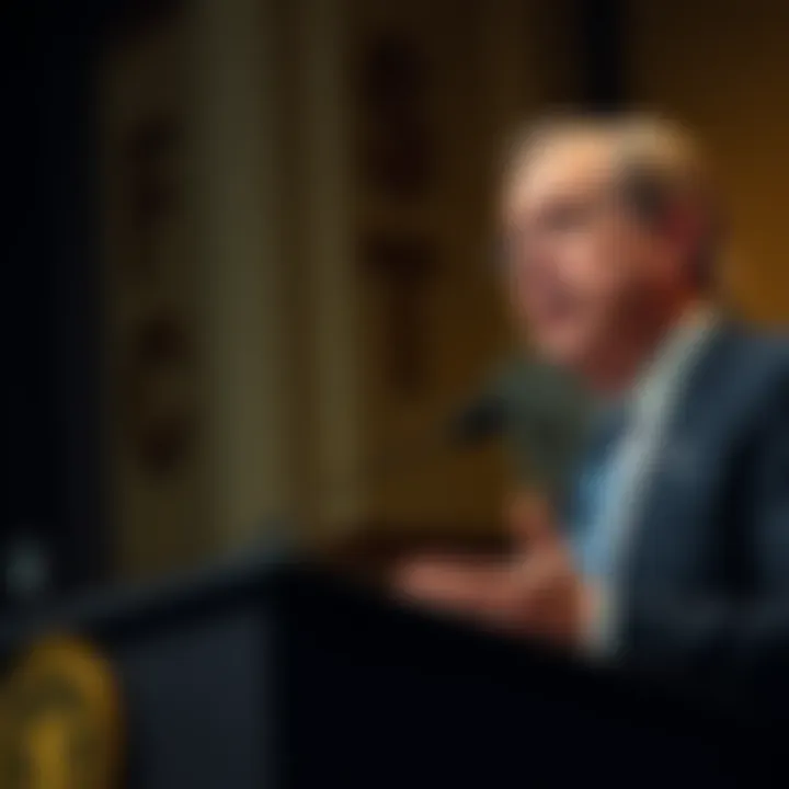 A former CFTC chair speaking at a podium about the need for clear cryptocurrency regulations for banks