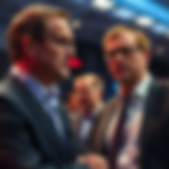 Gary Gensler standing next to Brad Garglinghouse at an event, speaking with a serious expression