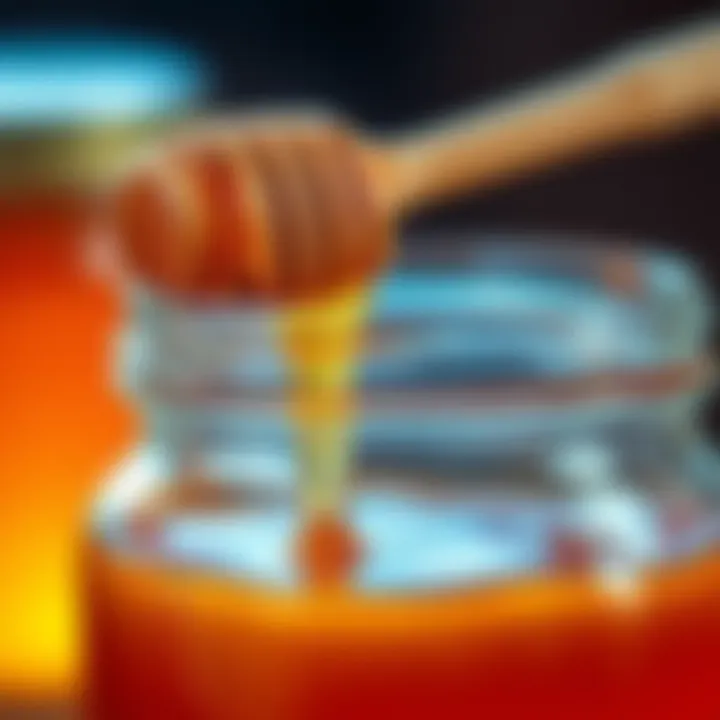 A close-up of a jar of honey with a wooden dipper resting on the rim, showcasing its thick, golden texture