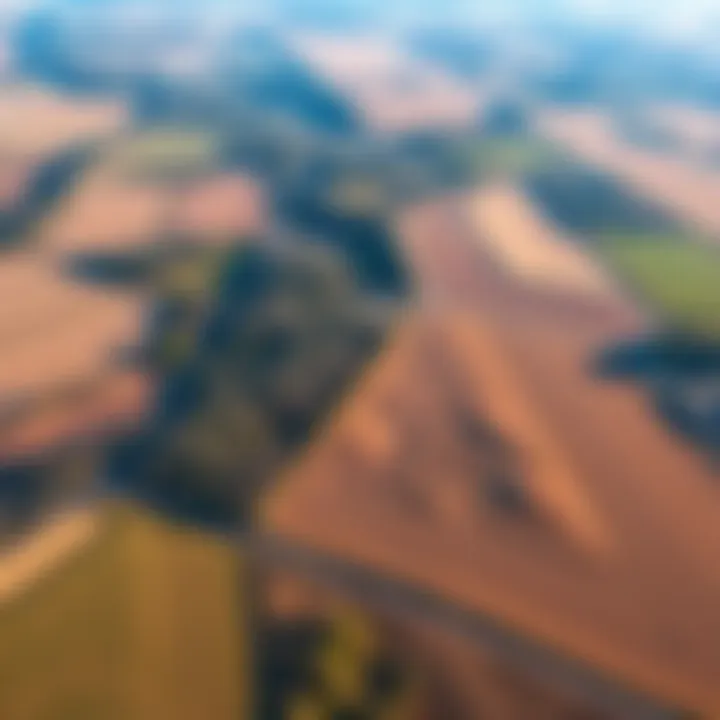 Aerial view of land with shifted parcel lines, showing clear boundaries that are misaligned, indicating potential land ownership issues.