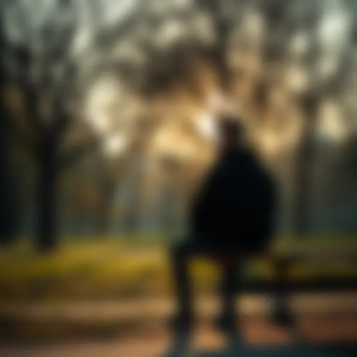 A person sitting alone on a park bench, deep in thought, surrounded by trees and sunlight, representing feelings of loss and searching for purpose.