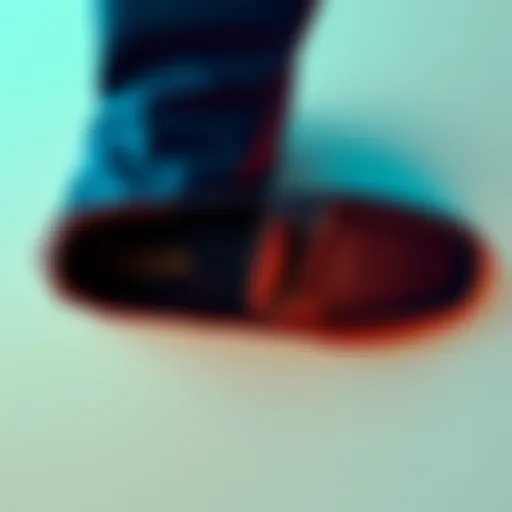 A top-down view of a 1925 Moc shoe, showcasing its shape and design as worn on a foot.