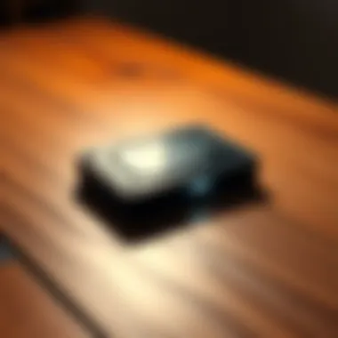 Trezor Safe 5 Wallet on a table Trezor Safe 5 Wallet placed on a wooden table with a soft light shining on it, showcasing its sleek design.